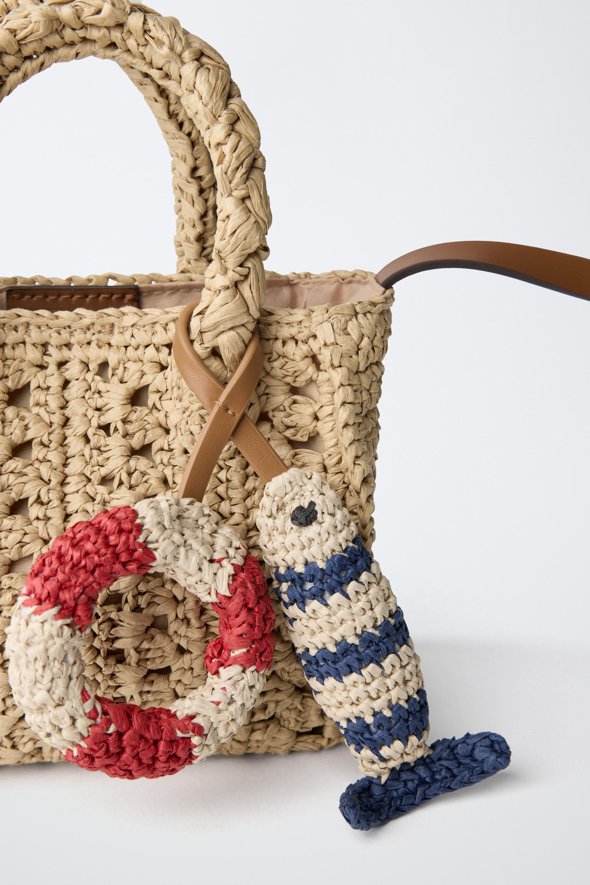 RAFFIA CROSSBODY BAG WITH MARINE CHARMS